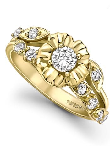 Diamond flower engagement ring set in 18ct yellow gold