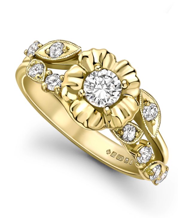 Diamond flower engagement ring set in 18ct yellow gold