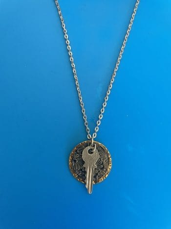 One of a kind unisex necklace with fabric print patterns gold and black plated and vintage sterling silver key  on 20