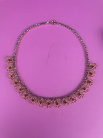 gold plated 1960s flower necklace with blue rhinestones