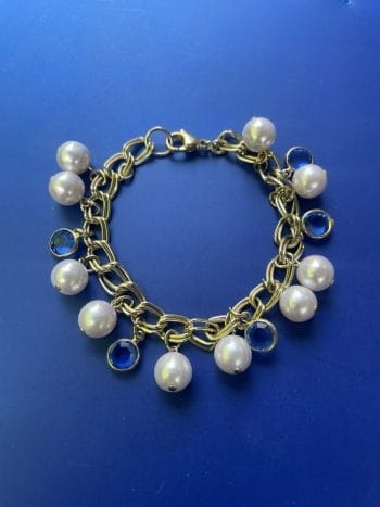 Blue and faux pearl remodelled vintage bracelet using original vintage materials  approx 7